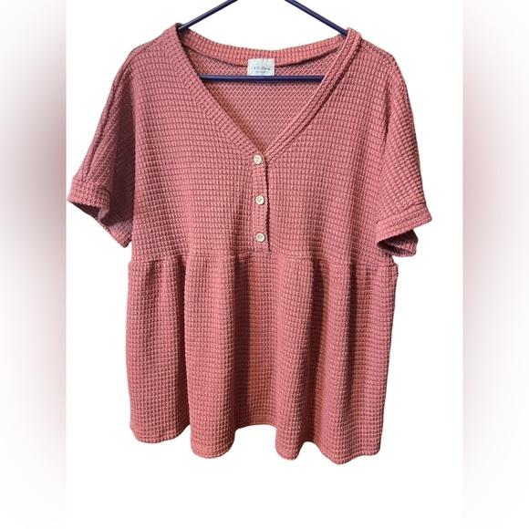 NWOT pink waffle knit short sleeved v-neck 3 button front with ruffle button. - Picture 1 of 4